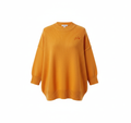 Professional product shot of golden orange ribbed sweater